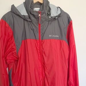 Colombia Mens Large Windbreaker with hoodie and front zipper.
